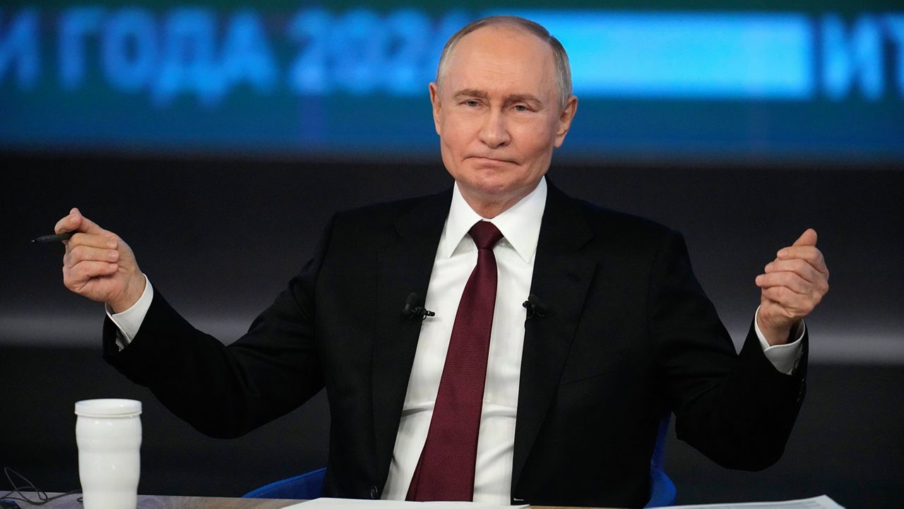 Russian President Vladimir Putin gestures while speaking during his annual news conference and call-in show at Gostinny Dvor in Moscow, Russia, Thursday, Dec. 19, 2024. (AP Photo/Alexander Zemlianichenko)