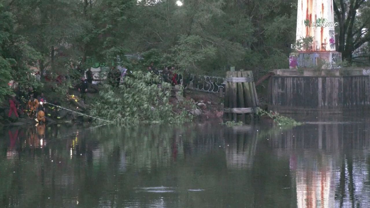 Three dead after car submerges in water in Queens