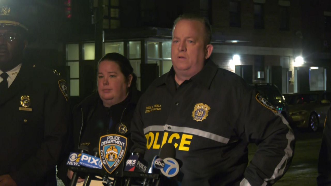 Chief of Patrol John Chell said two men ran away as officers approached the Queens lobby. (NY1 Photo)