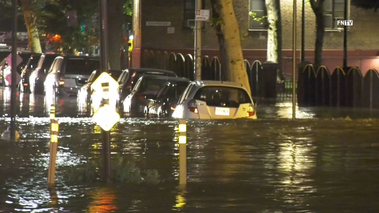 Broken pipe floods the streets of Long Island City