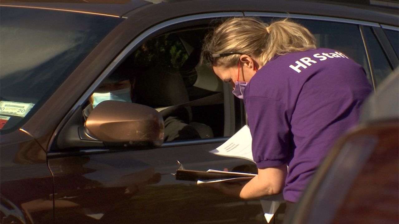 Rochester Catholic Family Center hols a drive-thru job fair