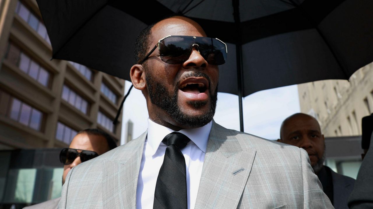 Musician R. Kelly leaves the Leighton Criminal Court building in Chicago on June 6, 2019. (AP Photo/Amr Alfiky, File)