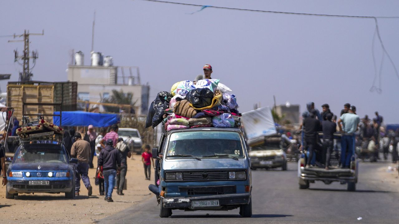 Displaced Palestinians arrive in central Gaza after fleeing from the southern Gaza city of Rafah in Deir al Balah, Gaza Strip, on Thursday, May 9, 2024. (AP Photo/Abdel Kareem Hana)