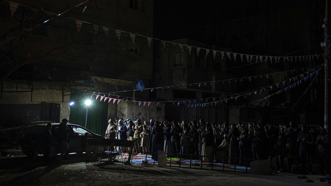 Muslim worshippers perform 