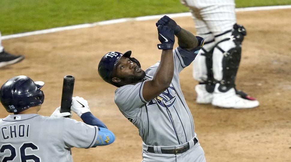 Tampa Bay Rays' Randy Arozarena, right, celebrates his home run off Chicago White Sox relief pitcher Garrett Crochet with Ji-Man Choi during the eighth inning of a baseball game Monday, June 14, 2021, in Chicago. (AP Photo/Charles Rex Arbogast)