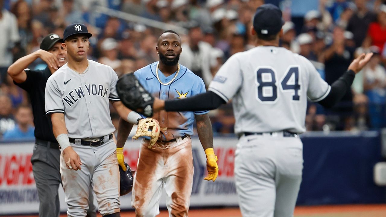 Tempers flare as Rays rally to beat Yankees 7-4