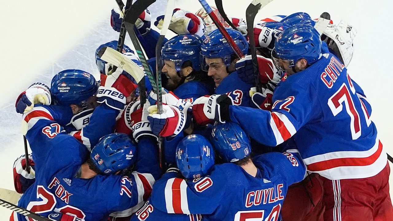 The Rangers celebrate after beating the Panthers in overtime of Game 2 on Friday, May 24, 2024.