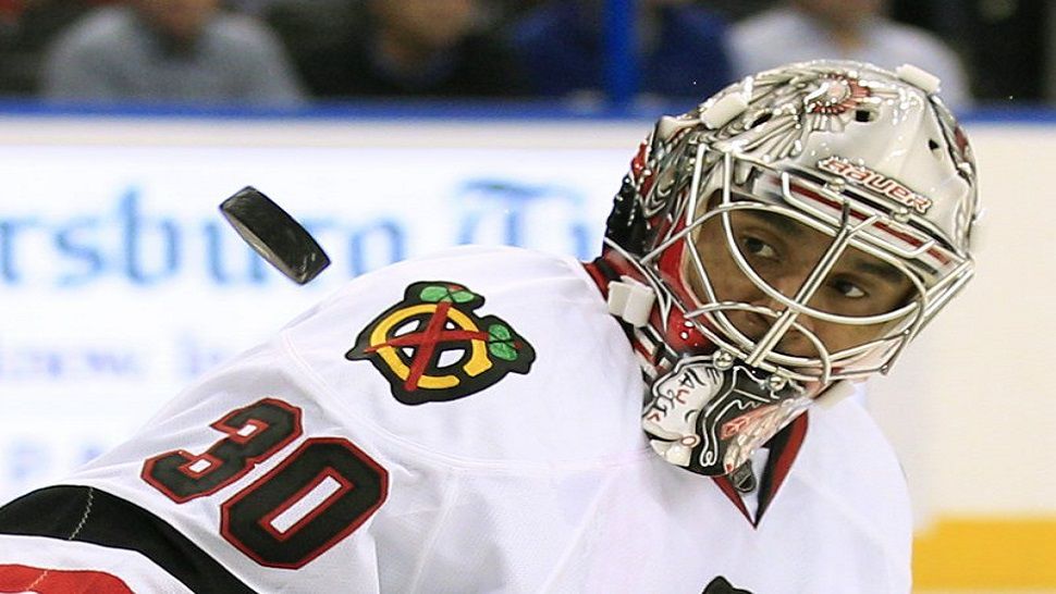 FILE - In this Nov. 4, 2011 file photo Chicago Blackhawks goalie Ray Emery keeps his eyes on a shot by the Tampa Bay Lightning during the second period of an NHL hockey game in Tampa, Fla. Emery has drowned in his hometown of Hamilton, Ontario. He was 35. Hamilton Police confirmed Emery was identified as the victim of the swimming accident Sunday, July 15, 2018. (AP Photo/Chris O’Meara, file)