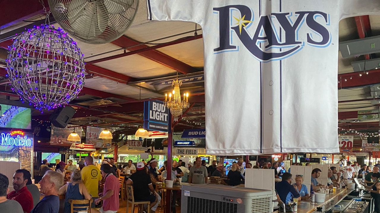 Rays fans watch the season's first game from Ferg's Sports Bar near Tropicana Field (Trevor Pettiford, Spectrum News)