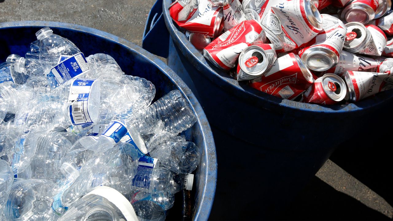 In this July 5, 2016, file photo, cans and plastic bottles brought in for recycling are seen at a recycling center in Sacramento, Calif. (AP Photo/Rich Pedroncelli, File)
