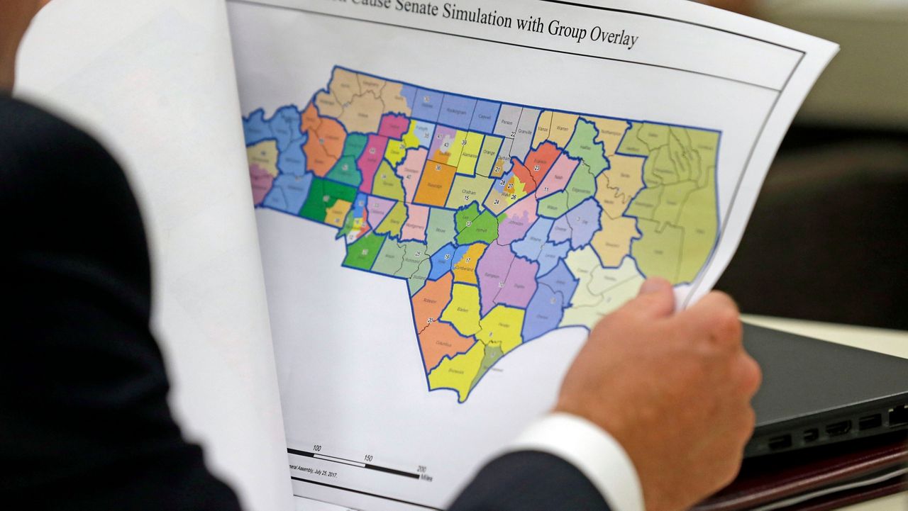 The North Carolina Supreme Court reversed rulings on cases involving voter ID and redistricting. A new Republican majority on the court took over in January and reopened the cases. 