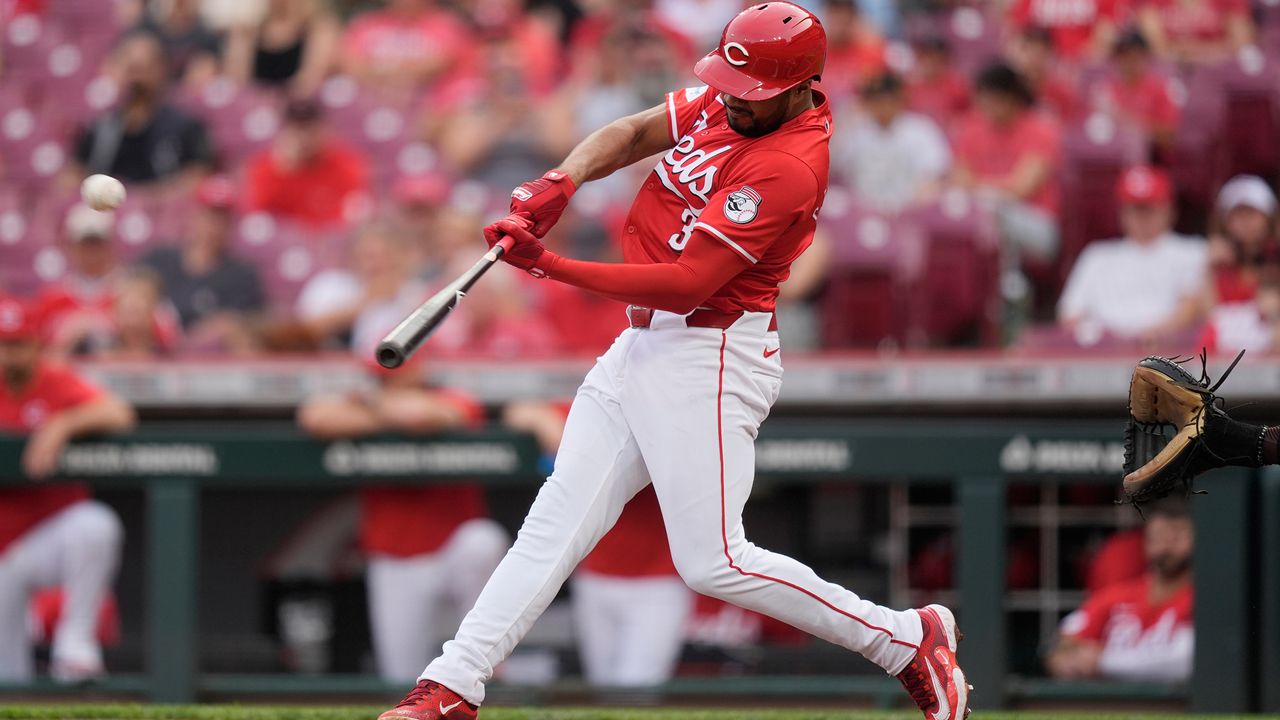 Cincinnati Reds' Jeimer Candelario hits a home run against the San Diego Padres during the first inning of a baseball game Wednesday, May 22, 2024, in Cincinnati. (AP Photo/Carolyn Kaster)