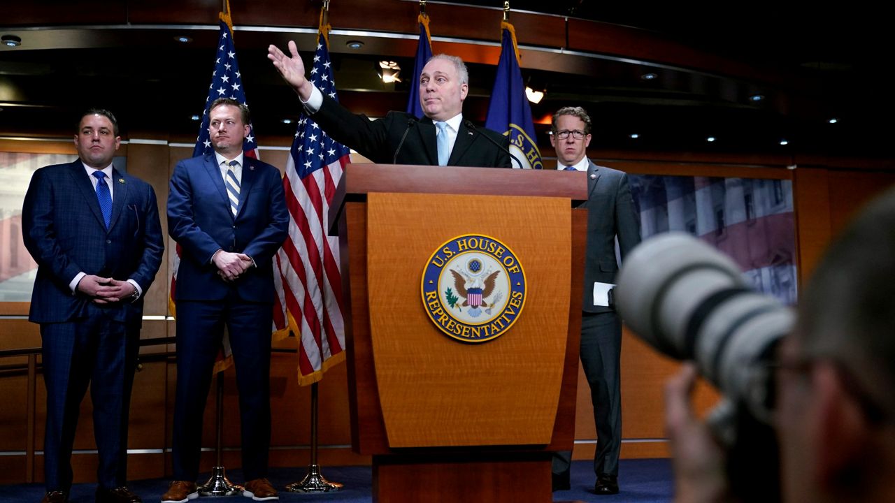 House Majority Leader Steve Scalise of La., takes questions from members of the press at a news conference on Capitol Hill in Washington, Tuesday, Jan. 10, 2023. Standing behind Scalise are Rep. Anthony D'Esposito, R-N.Y., from left, Rep Michael Cloud, R-Texas, and Adrian Smith, R-Neb. (AP Photo/Patrick Semansky)