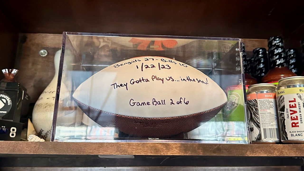 The Bengals hand out postseason game balls to local bars, restaurants as a thank you for supporting the team. (Photo courtesy of Rhinehaus)