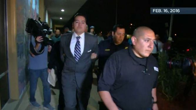 Ricardo Lopez, the former mayor of Crystal City, is led away by police in this image from February 2016. (Spectrum News/File)