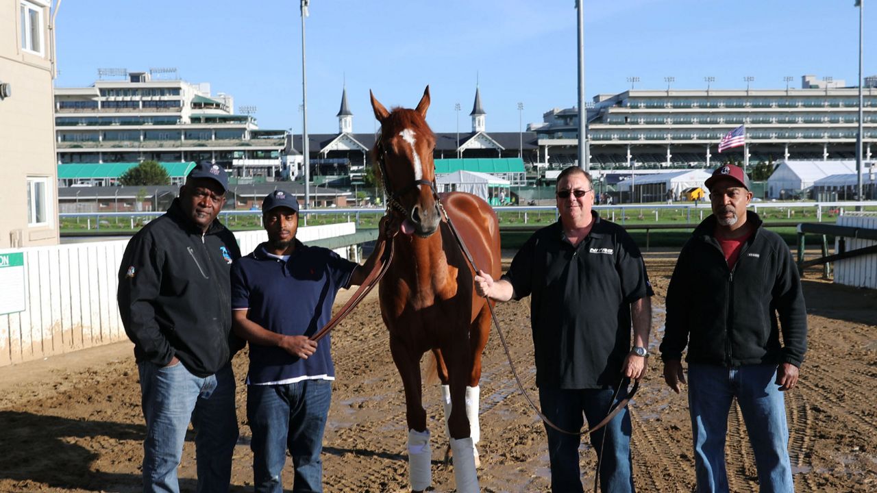 Kentucky Derby 148 winner Rich Strike and members of  his team before heading back to Lexington's Mercury Equine Center the day after the Derby. (Churchill Downs)