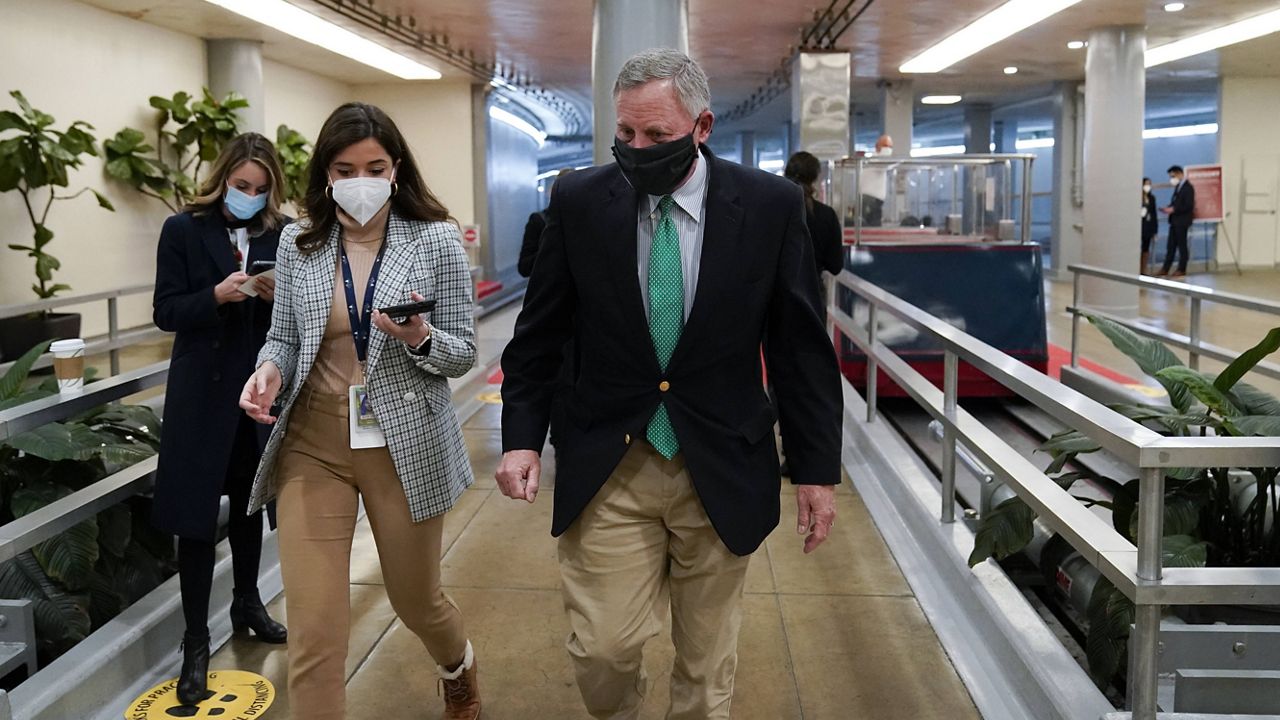 Sen. Richard Burr (R-NC) walks on Capitol Hill before Saturday's impeachment proceedings. (AP Photo/Alex Brandon)