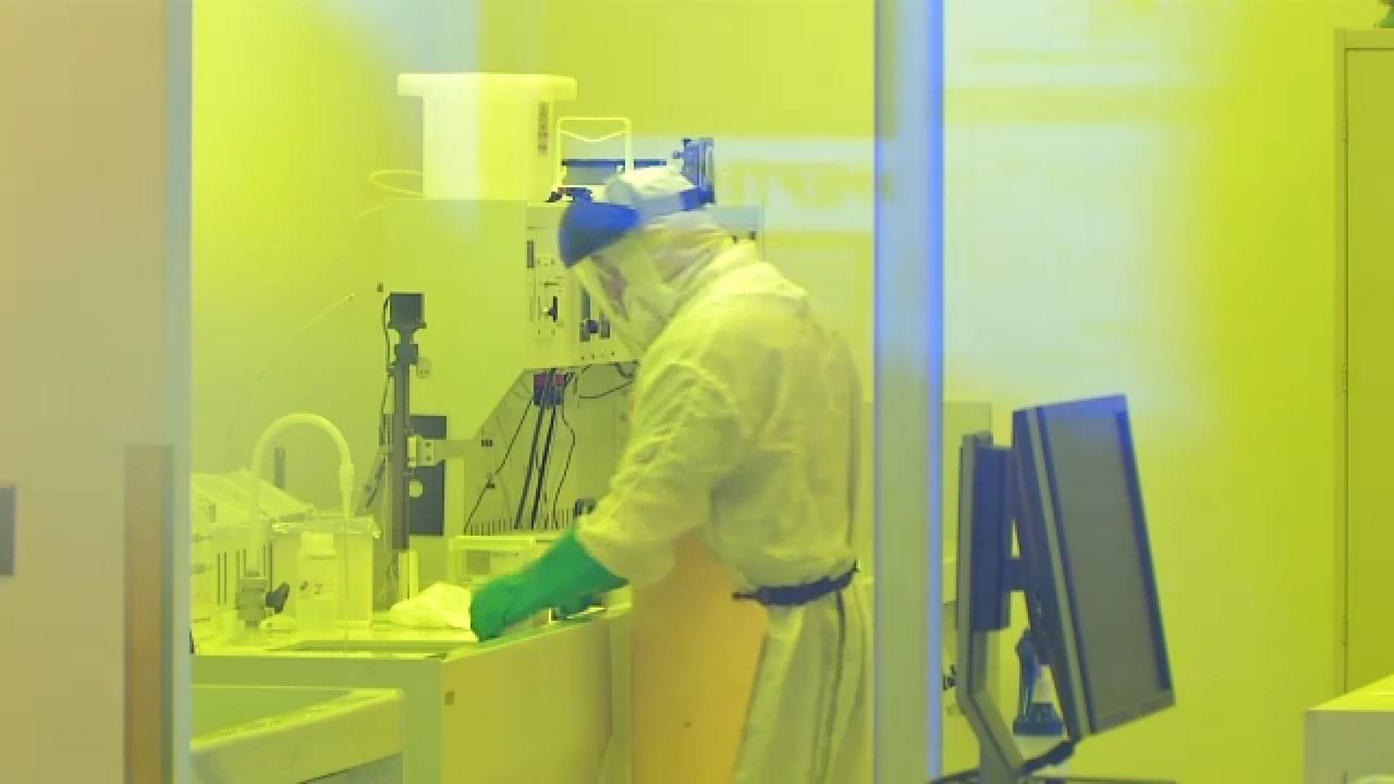 A worker at a RIT lab