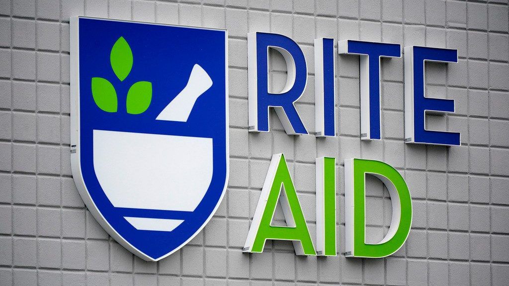 A Rite Aid sign is displayed on the facade of a store in Pittsburgh, Jan. 23, 2023. (AP Photo/Gene J. Puskar, file)