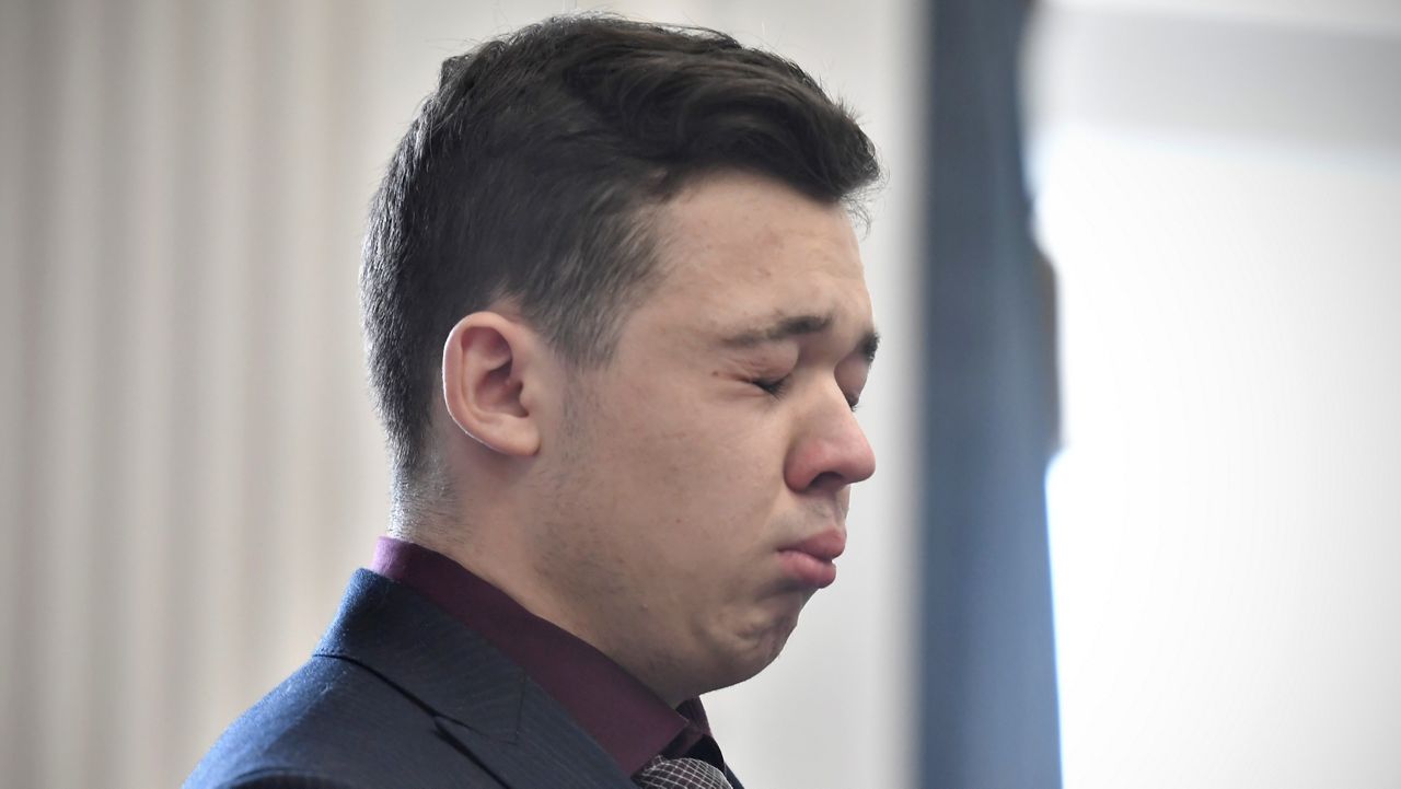 Kyle Rittenhouse closes his eyes and cries as he is found not guilt on all counts at the Kenosha County Courthouse in Kenosha, Wis., on Friday, Nov. 19, 2021.  (Sean Krajacic/The Kenosha News via AP, Pool)