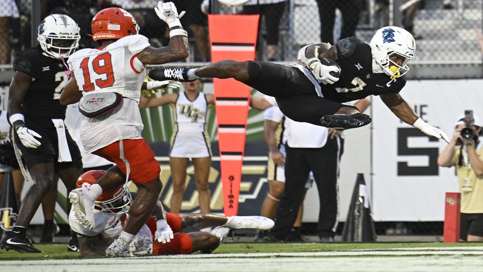 RJ Harvey&rsquo;s 4 TDs power UCF past Sam Houston, 45-14