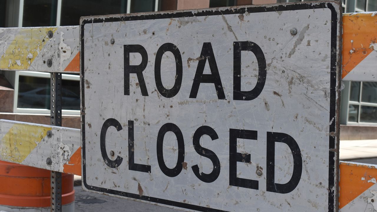 Road closed sign. (Spectrum News 1/Cody Thompson)