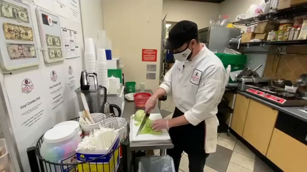 TakeOut Grill Thriving in Elmwood Village Gas Station