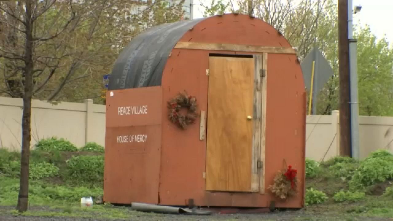 Groups build temporary housing for Rochester's homeless