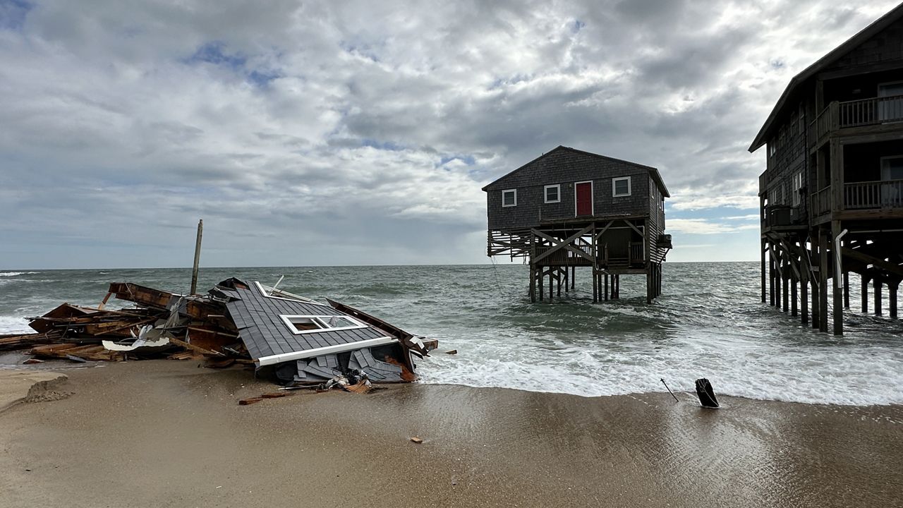 The Cape Hatteras National Seashore said an unoccupied home on G A Kohler Court collapsed, sending potentially dangerous debris into the ocean. (Spectrum News 1/Lauren Howard)