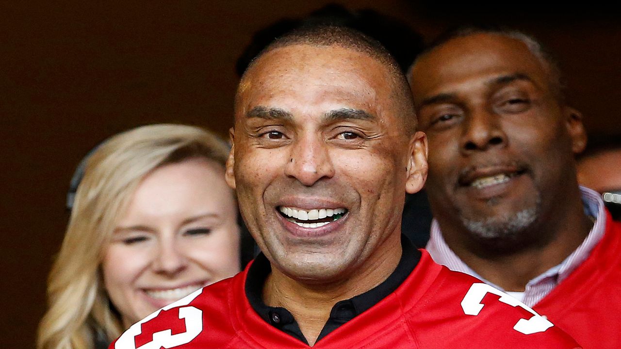 Former San Francisco 49ers running back Roger Craig smiles during halftime of an NFL football game between the San Francisco 49ers and the Cincinnati Bengals in Santa Clara, Calif., Sunday, Dec. 20, 2015. Versatile running back Roger Craig, and two-time Super Bowl-winning coaches Tom Coughlin and Mike Shanahan advanced to the next stage of consideration for the Pro Football Hall of Fame. The selection committees cut down the list of candidates from 31 seniors and 29 coaches and contributors to 12 in each category in results announced Thursday, July 27, 2023.(AP Photo/Tony Avelar, File)