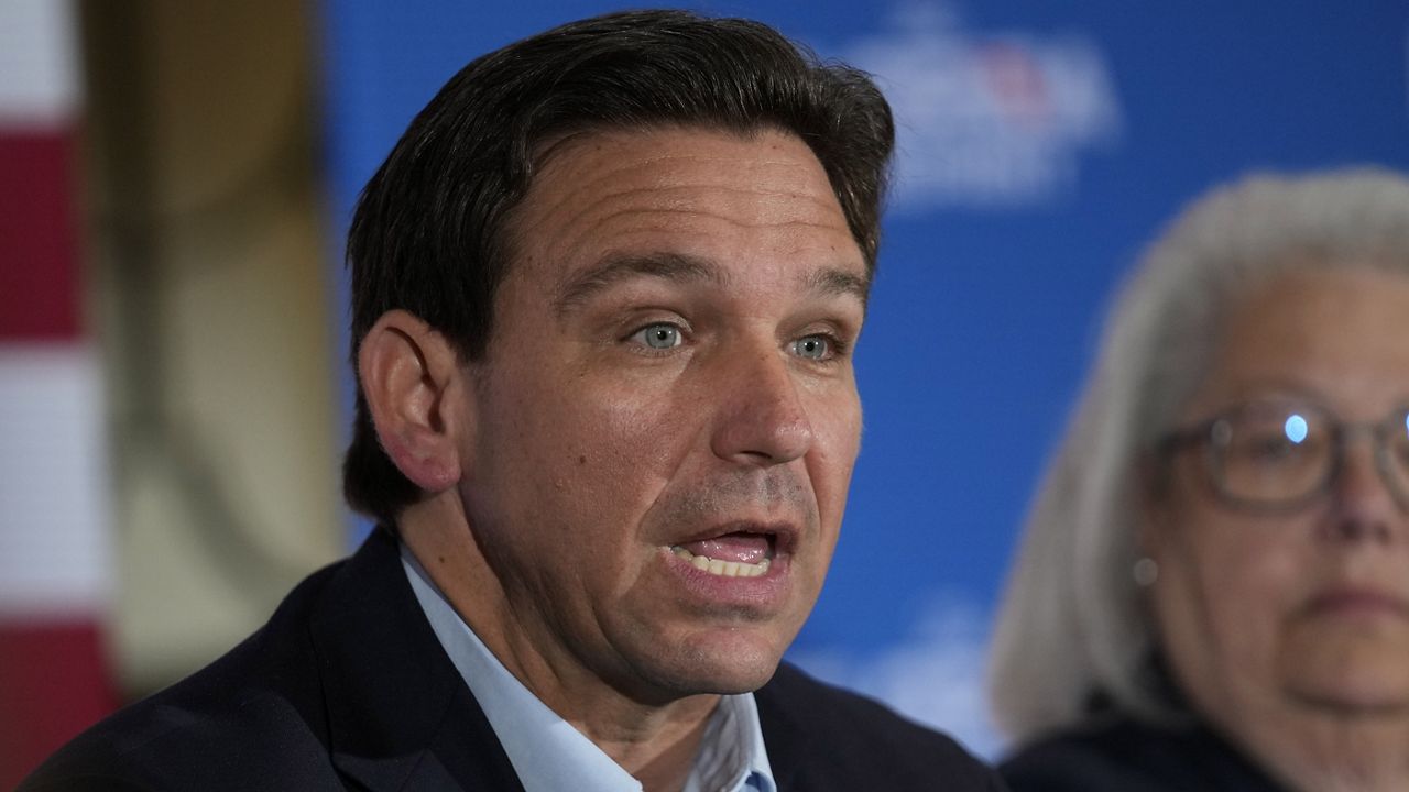 Florida Gov. Ron DeSantis speaks at a political roundtable Friday in Bedford, N.H. (AP Photo/Robert F. Bukaty)