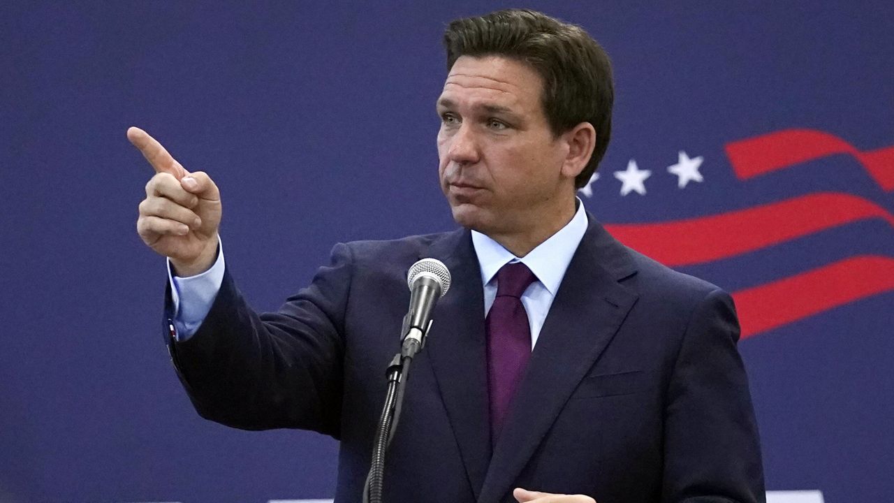 Republican presidential candidate Florida Gov. Ron DeSantis gestures during a speech Monday in Rochester, N.H. (AP Photo/Charles Krupa)