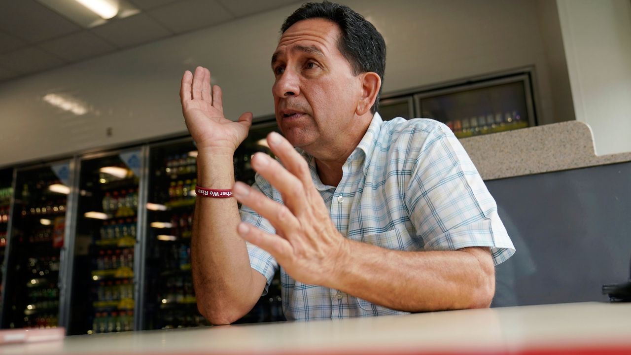 Uvalde County Commissioner Ronnie Garza talks about the state of the community, Thursday, Aug. 25, 2022, in Uvalde, Texas. The community, three months out from the shootings at Robb Elementary, is preparing for classes to resume in the coming weeks.(AP Photo/Eric Gay)