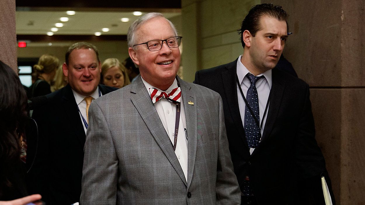 FILE - U.S. Rep. Ron Wright, R-Texas, walks to a session during member-elect briefings and orientation on Capitol Hill in Washington, Thursday, Nov. 15, 2018. (AP Photo/Carolyn Kaster)