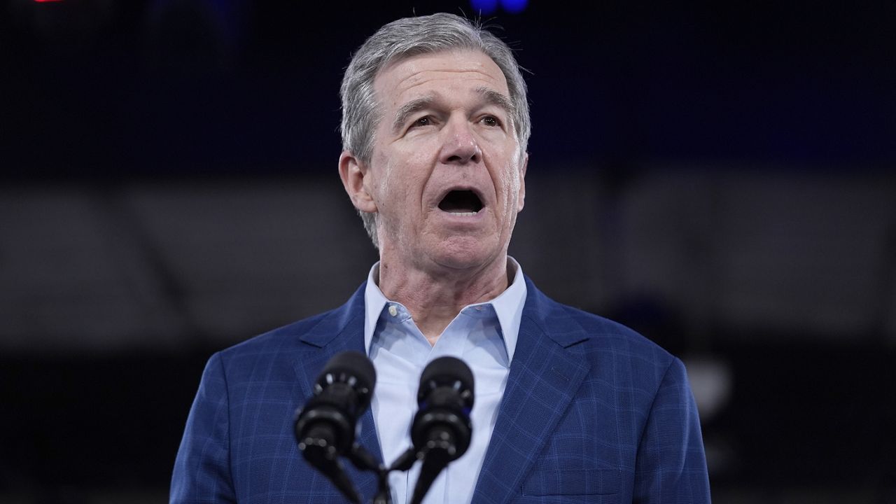 North Carolina Gov. Roy Cooper speaks at a campaign rally for President Joe Biden, Friday, June 28, 2024, in Raleigh, N.C. (AP Photo/Evan Vucci)