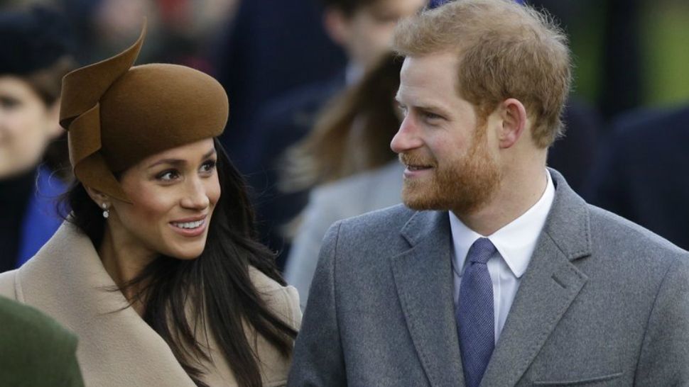This is a Monday, Dec. 25, 2017 file photo of Britain's Prince Harry and his financee Meghan Markle as they arrive to attend the traditional Christmas Day service, at St. Mary Magdalene Church in Sandringham, England. (AP Photo/Alastair Grant)