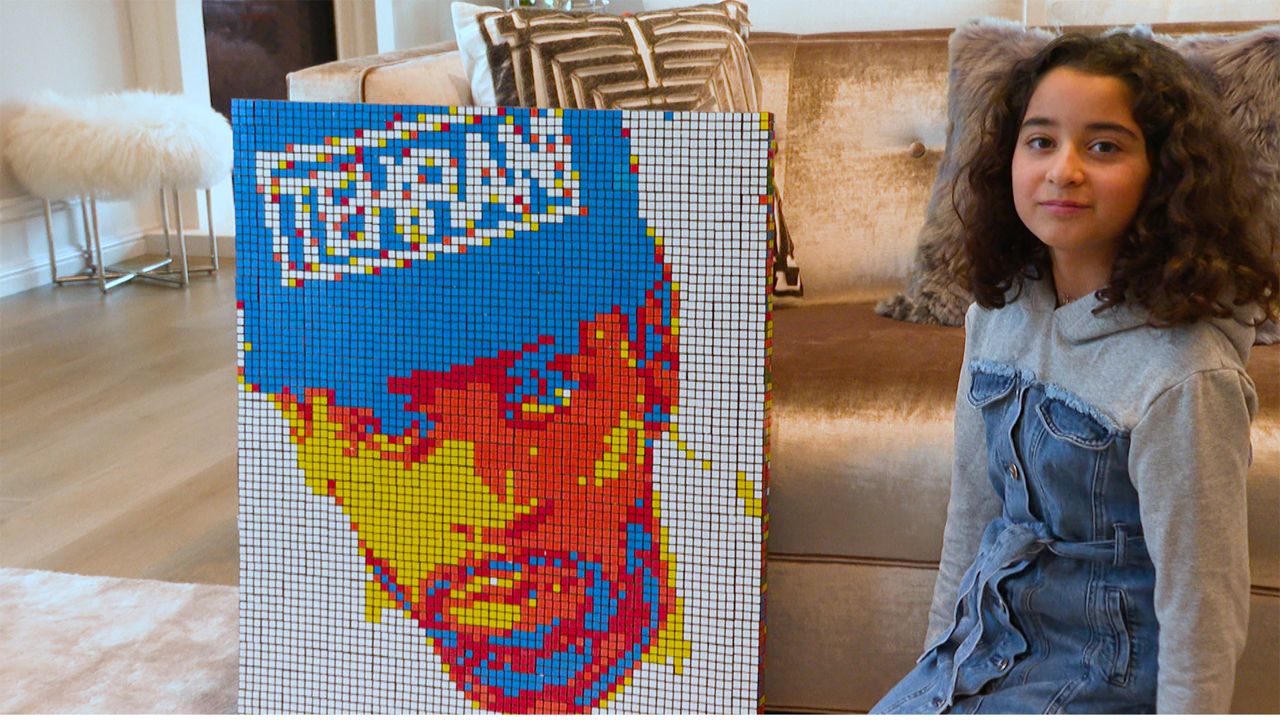 Young Artist Uses Rubik's Cubes as Preferred Medium