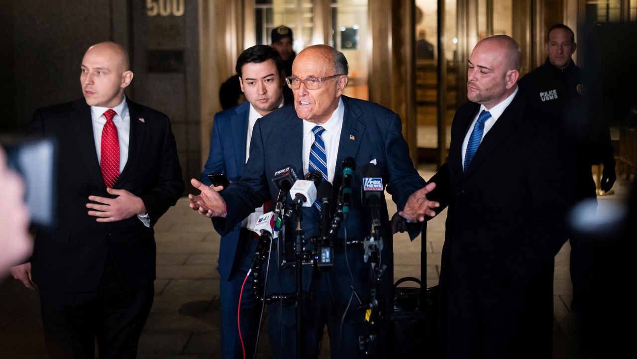 Rudy Giuliani speaks to the media outside of Manhattan federal court in New York, on Friday, Jan. 3, 2025. (AP Photo/Adam Gray)