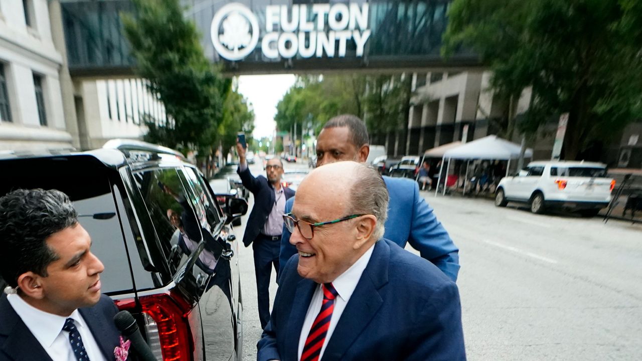Rudy Giuliani arrives Wednesday at the Fulton County Courthouse in Atlanta. (AP Photo/John Bazemore)