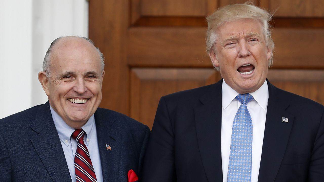 Donald Trump, right, and Rudy Giuliani (AP Photo/Carolyn Kaster)