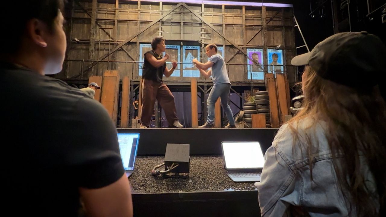 Pre-show rehearsal prepares actors for rain-drenched rumble scene in 'The Outsiders'