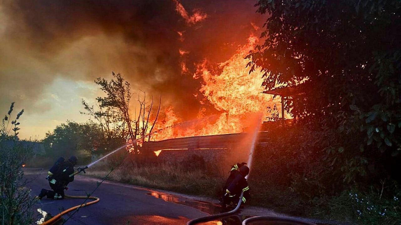 In this photo provided by the Ukrainian Emergency Service, firefighters put out a fire following a Russian attack in the Kyiv region of Ukraine on Wednesday, July 9, 2025. (Ukrainian Emergency Service via AP)
