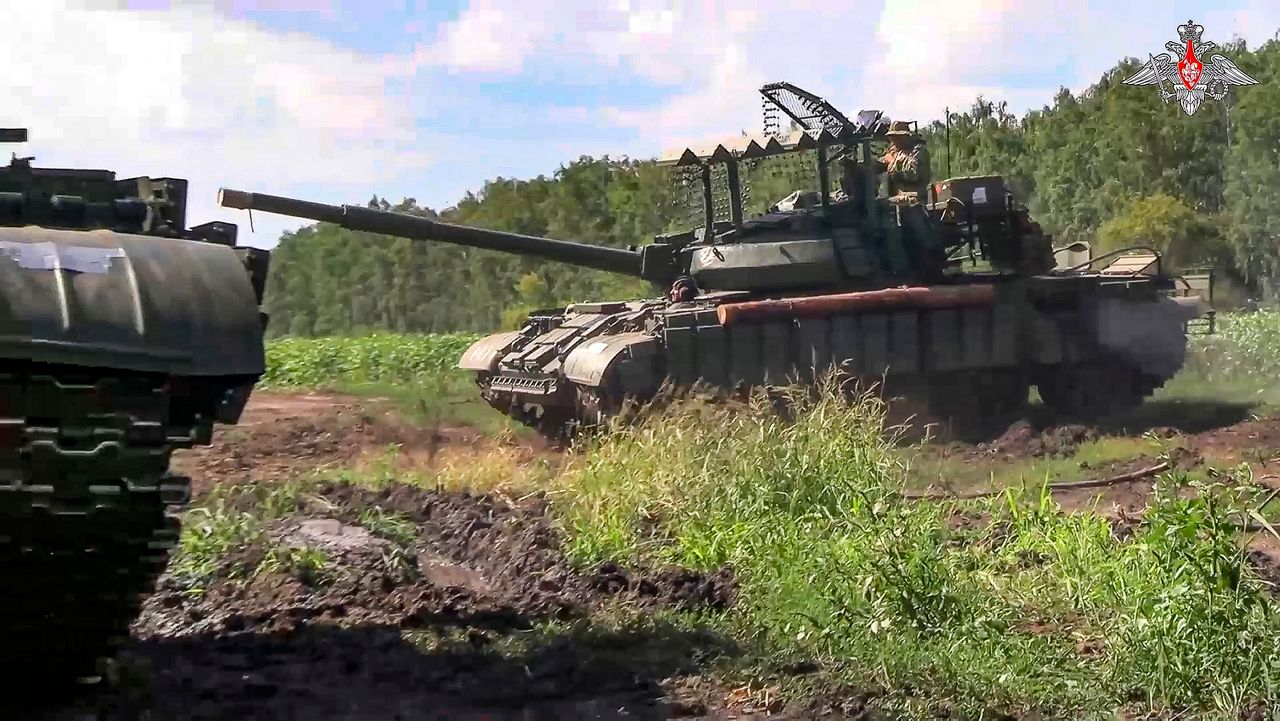 In this photo taken from video released by the Russian Defense Ministry on Saturday, Aug. 10, 2024, Russian Army tanks take a position at an area of Kursk region of Russia.