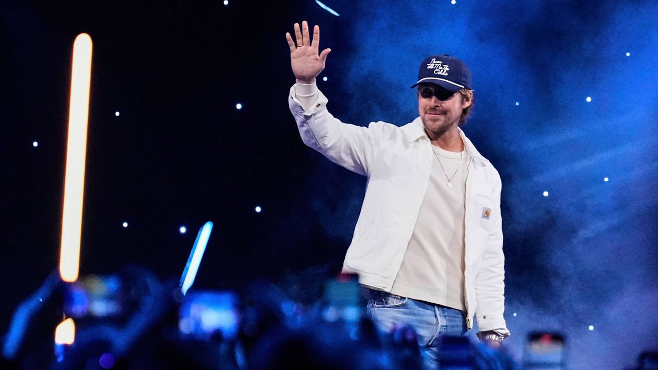 Actor Ryan Gosling waves at audience members during a fan convention called the Star Wars Celebration in Chiba, Japan, near Tokyo, Friday, April 18, 2025. (AP Photo/Hiro Komae)