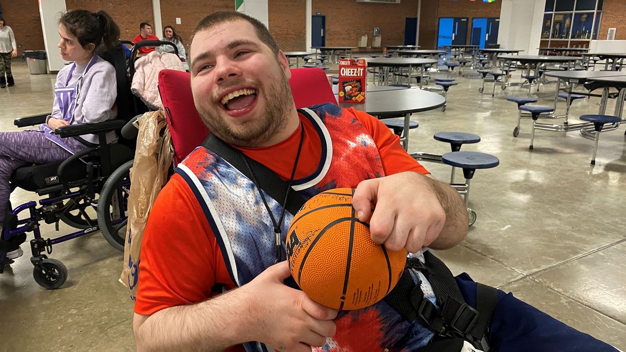 Ryan McCarrick enjoys working at Churchill Perk. His favorite part is getting to play basketball after his shift. (Spectrum News 1/Ashley N. Brown)