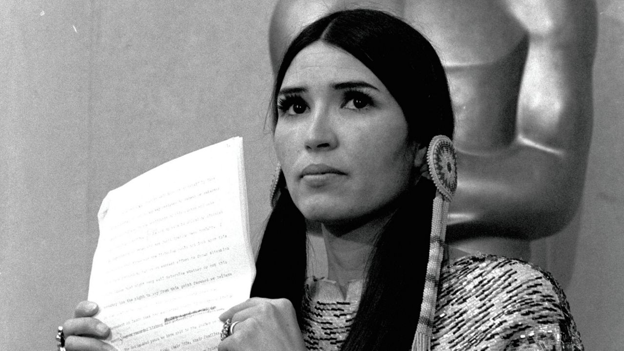  Sacheen Littlefeather appears at the Academy Awards ceremony to announce that Marlon Brando was declining his Oscar as best actor for his role in "The Godfather," on March 27, 1973. (AP Photo, File)
