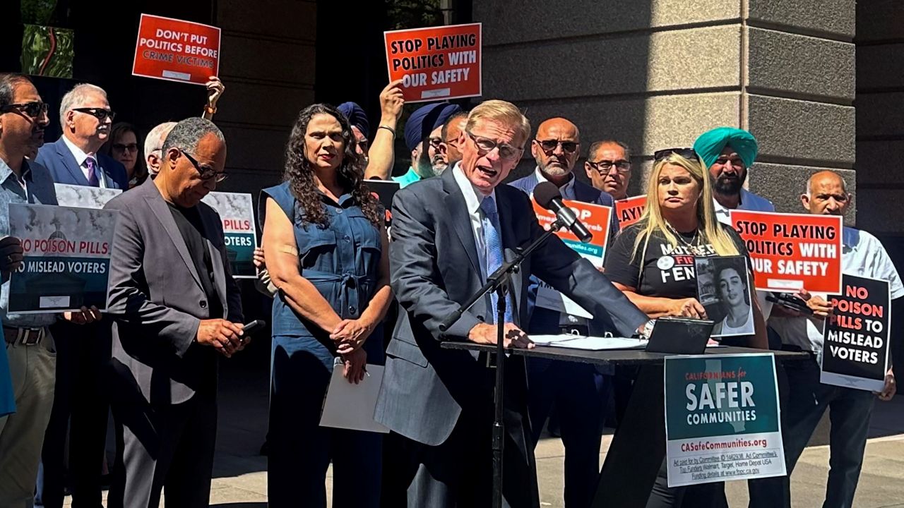 Greg Totten, a representative of Californians for Safer Communities, speaks at a news conference about a ballot initiative to bring back penalties for shoplifting and drug offenses on June 12, 2024, in Sacramento, Calif. The tough-on-crime initiative could play a key role in a handful of contested U.S. House races that would help determine control of Congress. (AP Photo/Tran Nguyen)