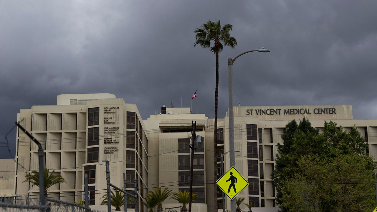 In this Wednesday, April 8, 2020, photo, the St. Vincent Medical Center building in Los Angeles is viewed. (AP Photo/Damian Dovarganes)