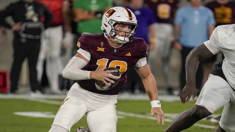 Arizona State quarterback Sam Leavitt (10) looks for running room against UCF during the first half of an NCAA college football game Saturday, Nov. 9, 2024, in Tempe, Ariz. (AP Photo/Darryl Webb)