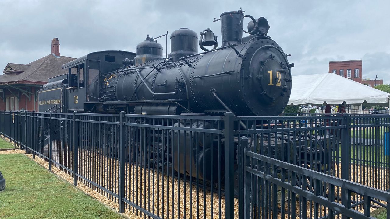 The Historic Engine #12 sits in Downtown Sanford, North Carolina. Two Amtrak trains run through the city each day, but Sanford has not had passenger rail service for more than 50 years, the mayor-elect said Tuesday. (Photo: Charles Duncan)